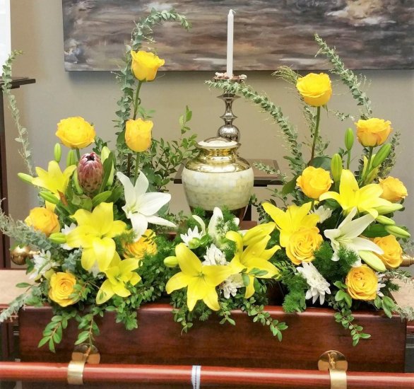 1 flowers around urn yellow roses yellow lilies - Click Image to Close