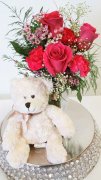 0 a bear hug with roses